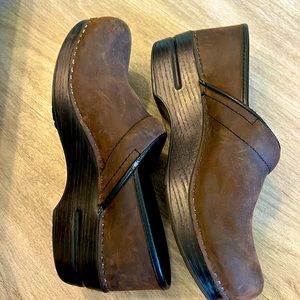 Lightly worn Dansko professional clogs.